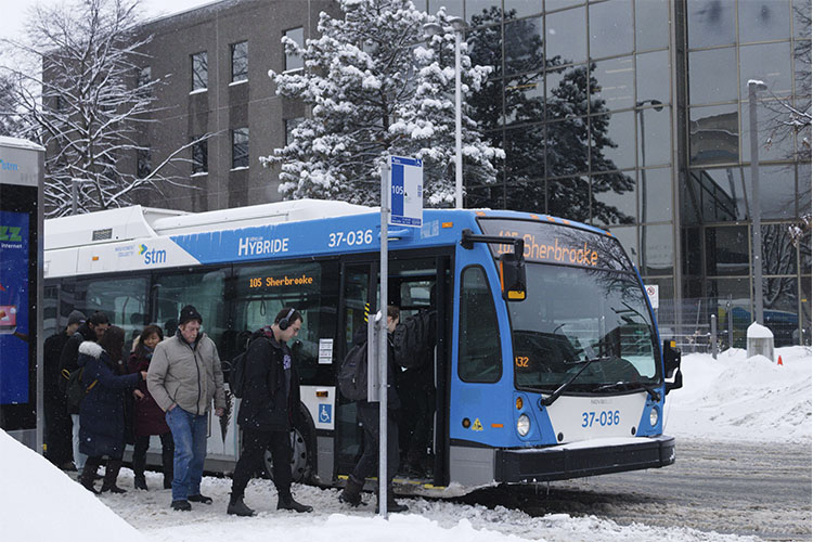 Commuters boarding the 105 bus
