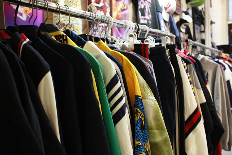 Rack of clothing in thrift shop
