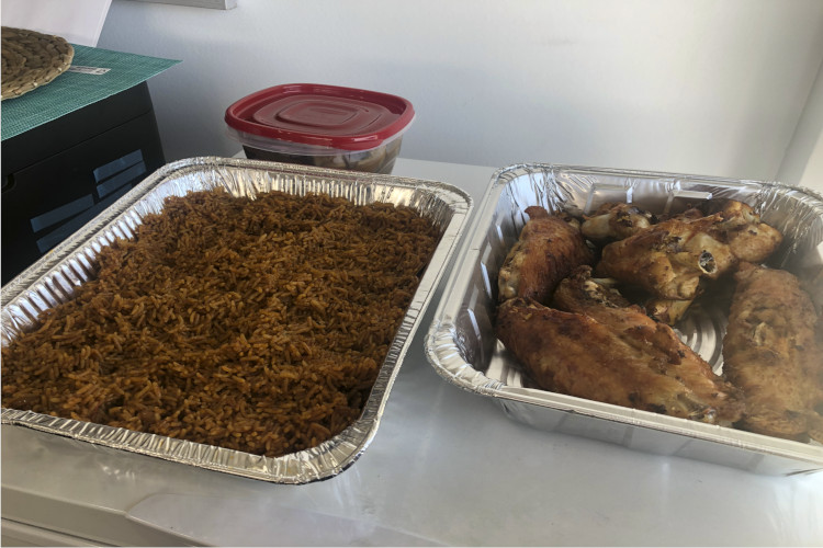 Prepared trays of Nigerian food at her home business