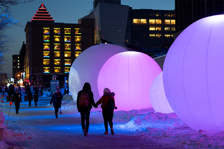 Nighttime shot of an immersive art installation in Montreal