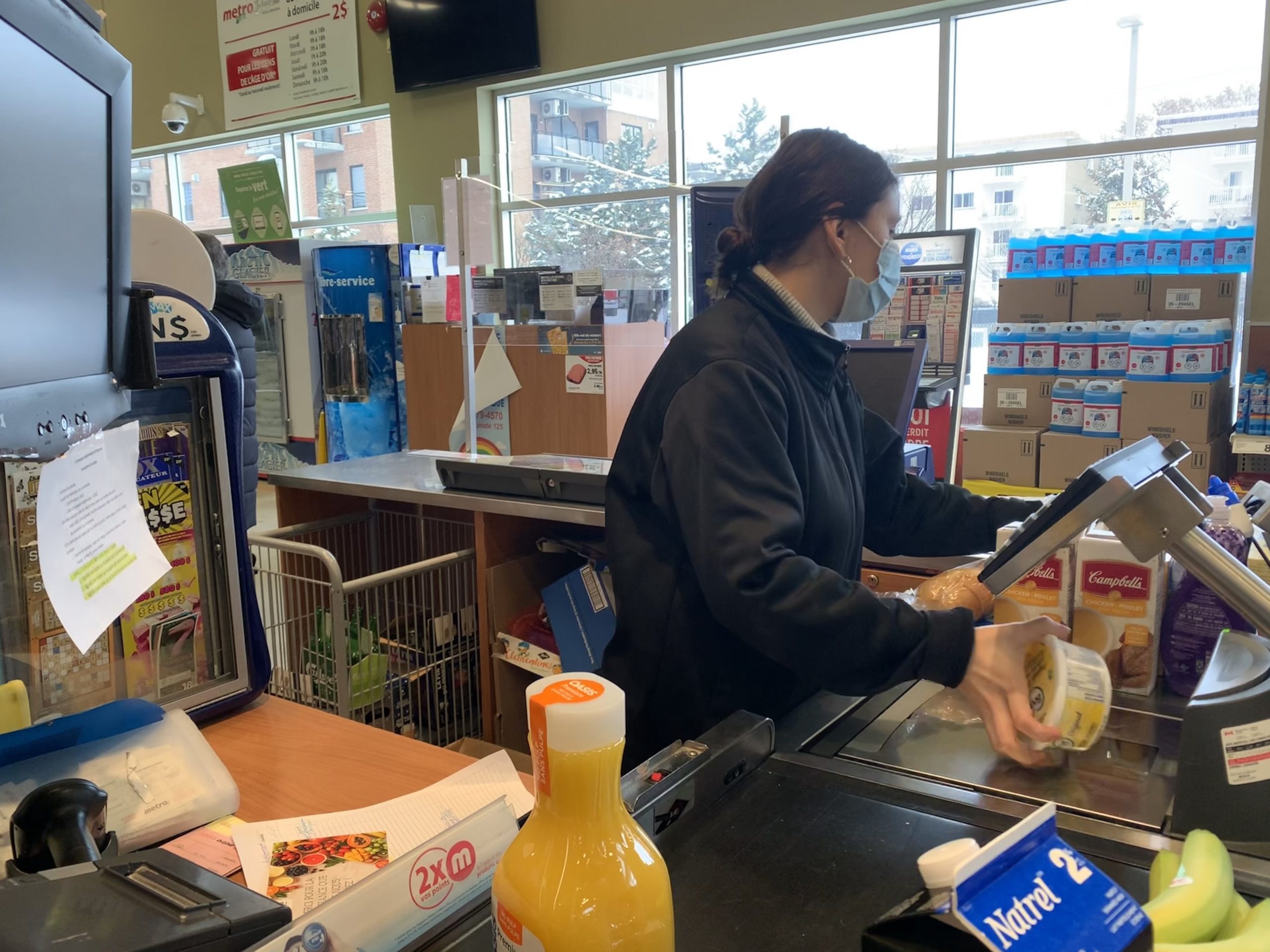 A cashier at a grocery store.