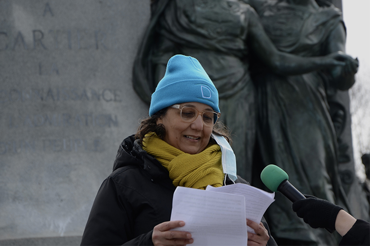 Sabrina Lemeltier delivers a speech at an anti-violence protest.