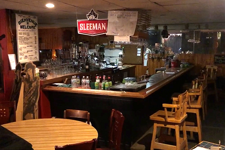 An empty bar in Montreal where live music was often played