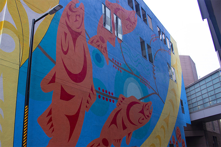 Salmon in alley Indigenous art mural