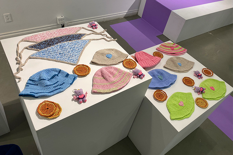 An array of crochet items at an exhibition