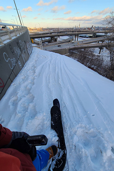Snow skater enjoys a high-top view