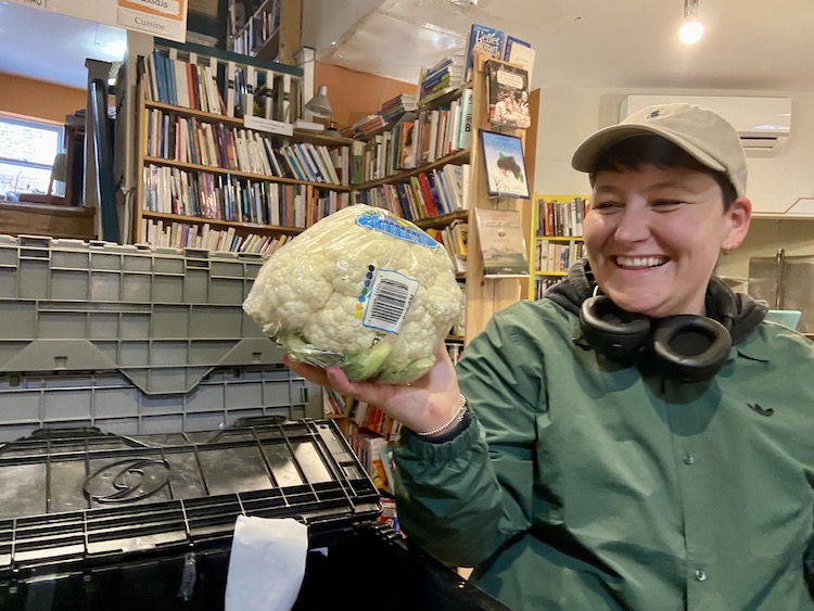 A Marché SecondLife customer shows off their cauliflower.