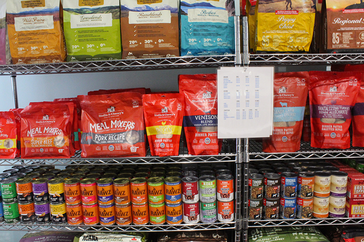 Shelves of dried raw dog food inside locally owned pet shop
